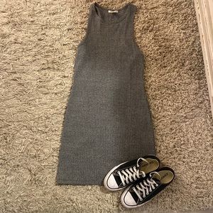 Midi length with a scoop neckline and tank cut size large runs small.